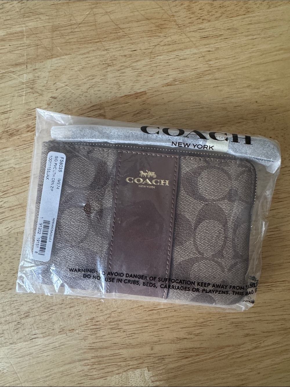 Coach Brown Signature Canvas Bifold Wallet with Leather Trim